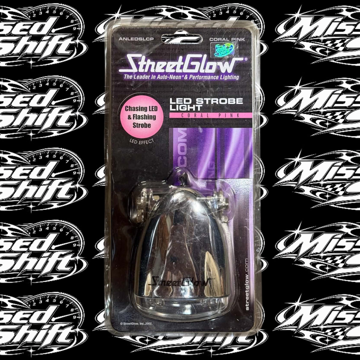 Streetglow coral pink LED strobe light in original package on Missed Shift logo background