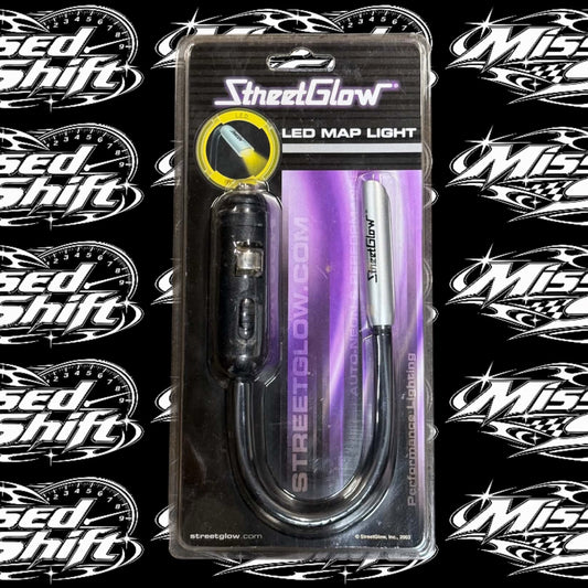 StreetGlow yellow LED map light in original 2003 packaging on Missed Shift logo background
